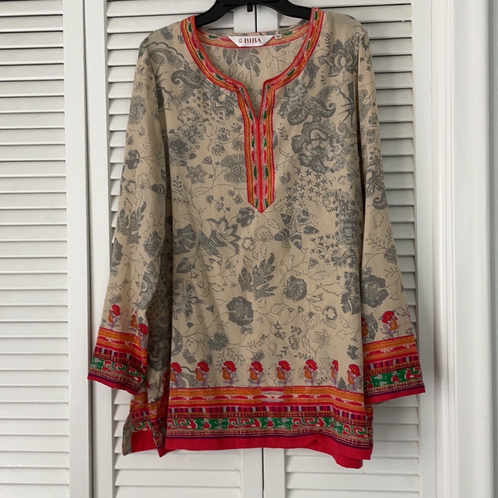 Bohemian Chic floral blouse with beautiful orange colors. Size Small.